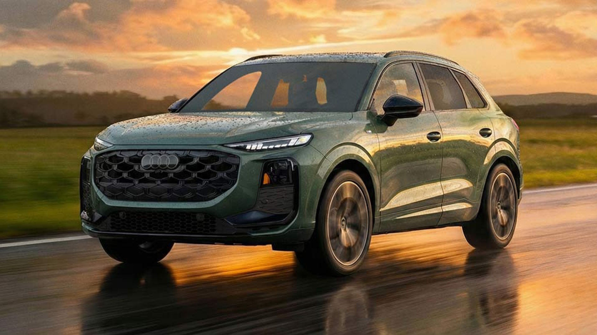 Side profile view of a parked Audi Q3. 