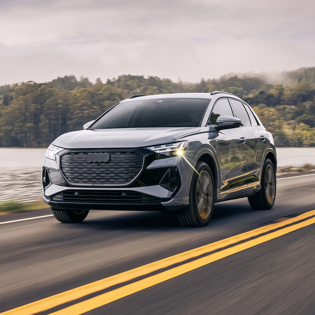 2026 Audi Q4 e-tron Exterior Driving Near Lake