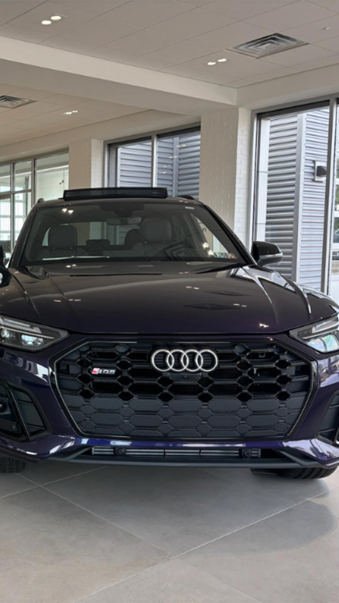Front view of an Audi in the dealership showroom