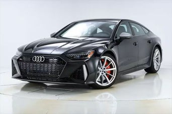 Three quarter view of an Audi parked.