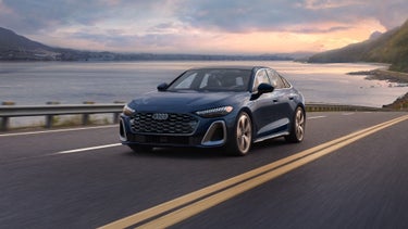 3/4 front view of the Audi A5 in motion.