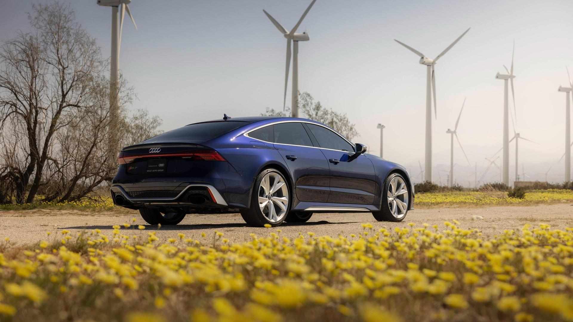 Right-profile facing view of an Audi RS7 parked.