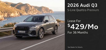Three quarter view of an Audi Q3 parked.