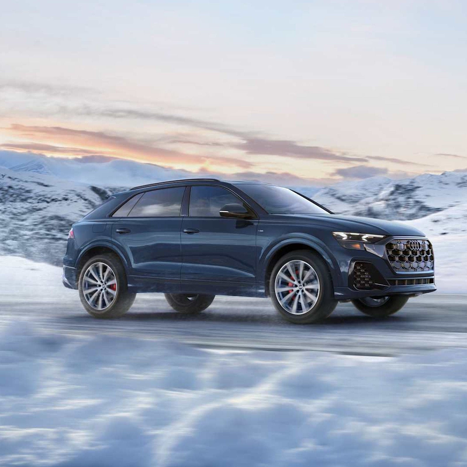 2026 Audi Q8 on the open road, Ultra Blue.