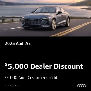 Front view of Audi A5 driving.