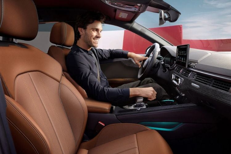 Person driving audi vehicle view inside car