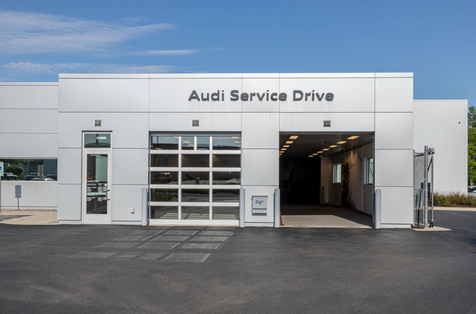 Front profile view of an Audi Q5 vehicle being serviced.