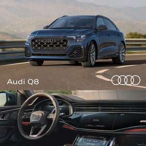 Front View of a Q8 with a inside view of the driver's side dashboard.