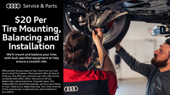 Service technician servicing a vehicle