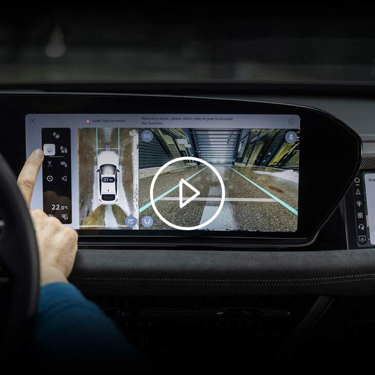 Close-up on the MMI screen, showing the reverse assist feature on the Audi Q3.