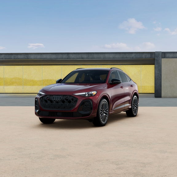 Three-quarter front view of the all-new Audi SQ5 Sportback parked.