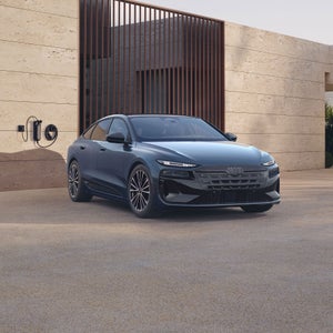 3/4 front view of the Audi A6 Sportback e-tron charging.