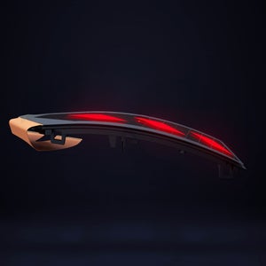 Close-up on the digital OLED rear lights lit up against a darkened background.
