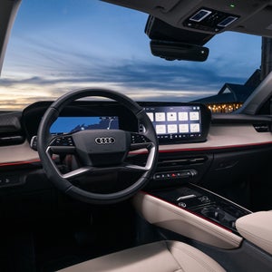 Close-up of the wraparound virtual cockpit in the Audi Q3. 