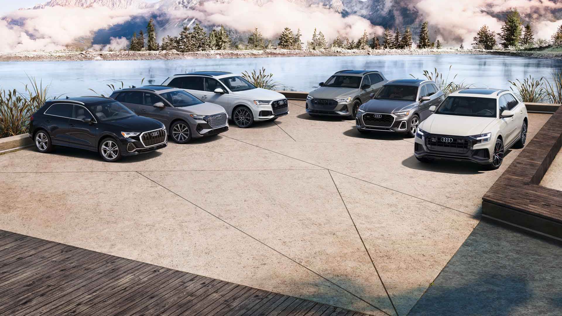 A lineup of Audi vehicles.