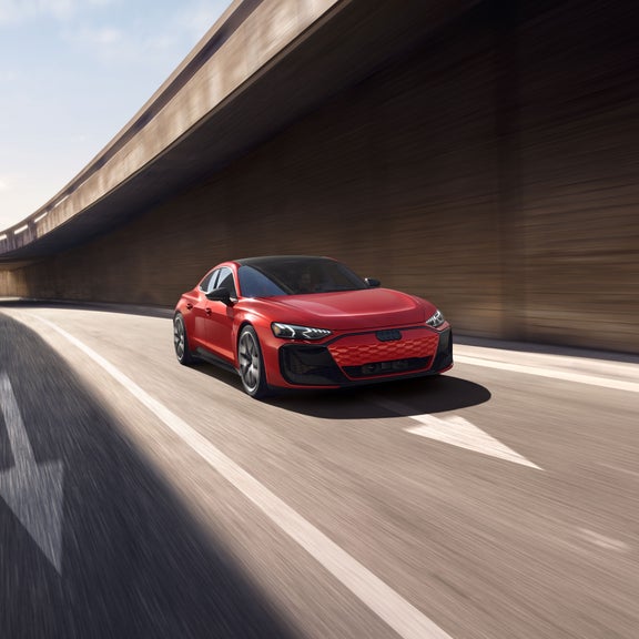 Front view of the Audi RS e-tron GT in motion. 