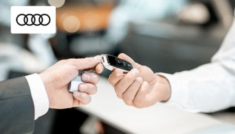 Certified pre-owned Audi vehicles lined up outside Audi Dayton, serving Dublin and Montgomery County. 