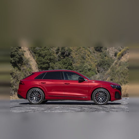 2026 Audi SQ8 profile driving — coupe-SUV silhouette at Audi Sewickley