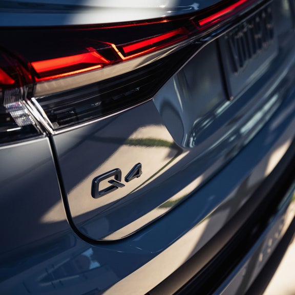 Close up on the Q4 badge on the Audi Q4 e-tron. 