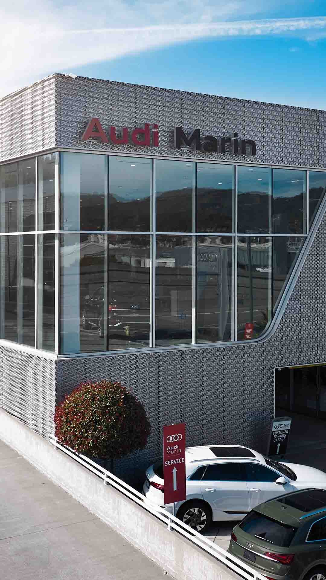 Front profile view of the Audi Marin dealership.