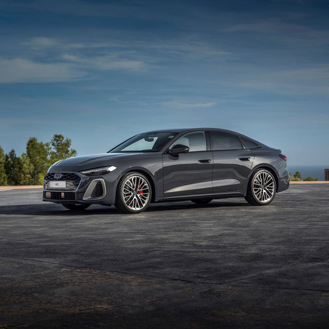 Three quarter view of an Audi A5 Sedan parked.
