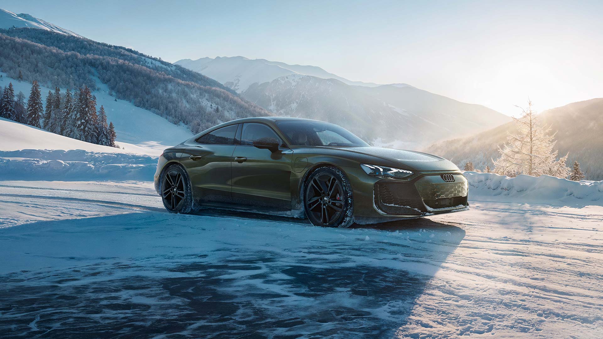 Side profile of an Audi RS e-tron GT parked in the snow. 