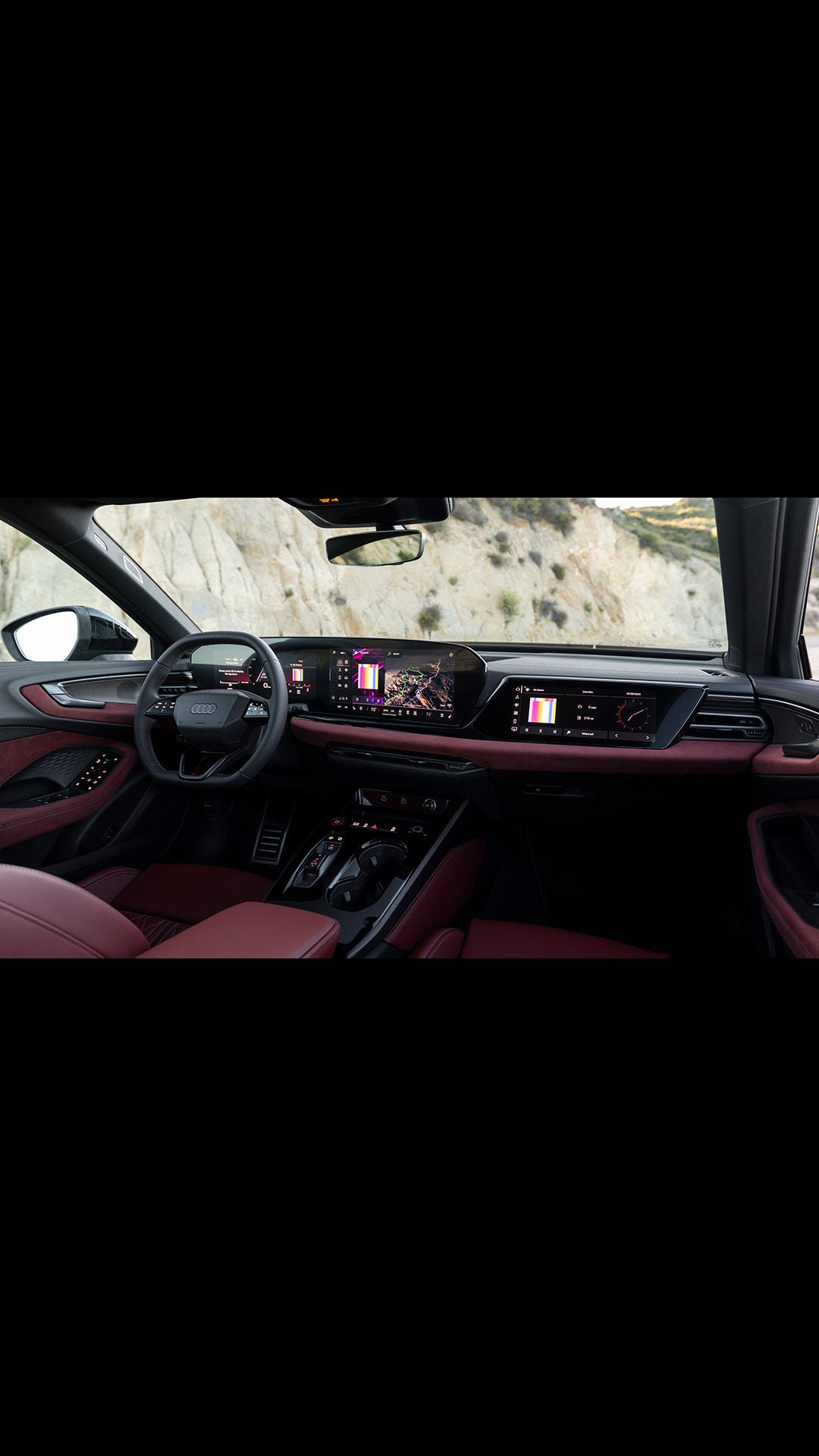 Interior cabin view of all new 2025 Audi A5 specs with red leather