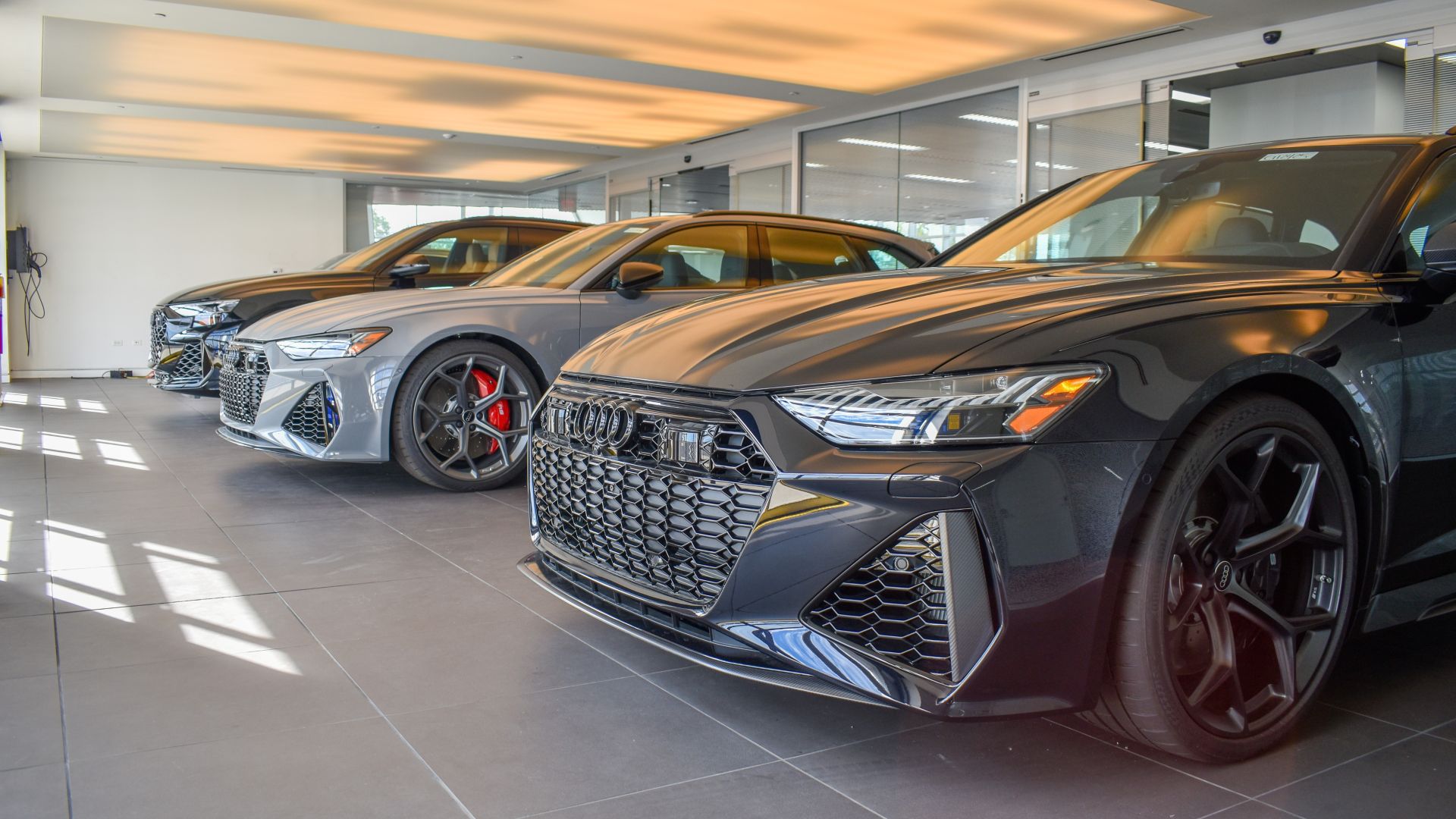 Audi vehicles in a lineup.