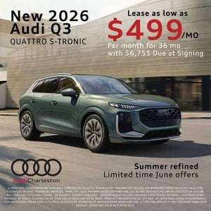 Side view of an Audi Q3 driving.