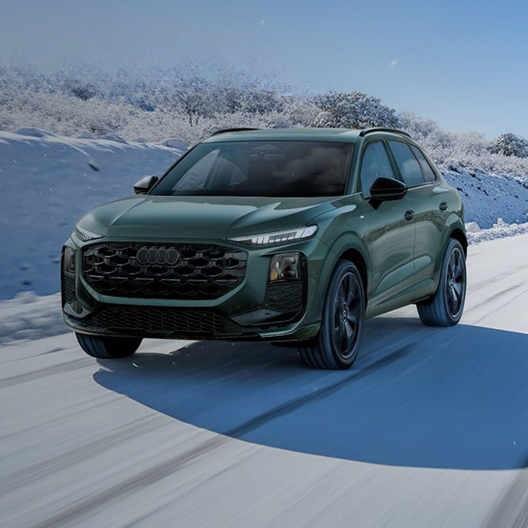 image of a 2026 Audi Q3 driving in the snow