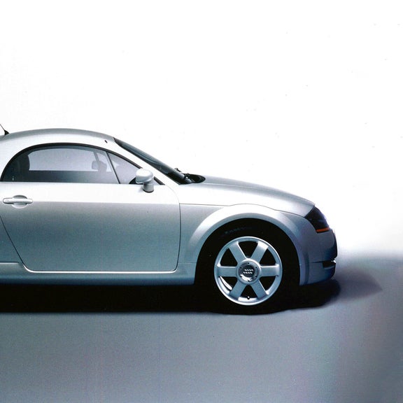 Side view of a silver Audi TT Coupe concept car.