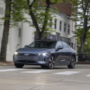 2026 Audi A5 Sportback front driving city — discover the A5 at Audi Sewickley near Pittsburgh