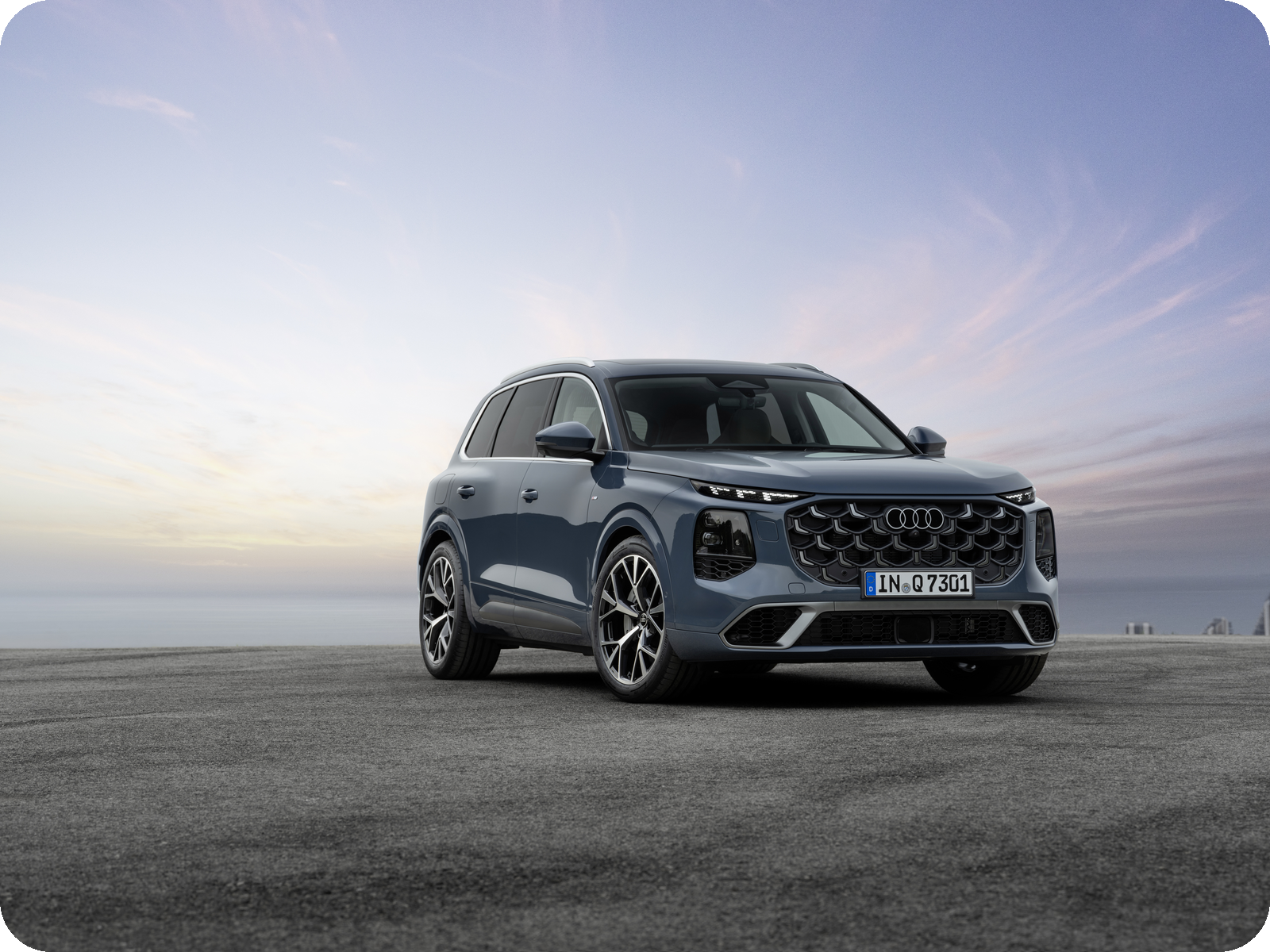 Redesigned 2027 Audi Q7 — front three-quarter parked at dusk.