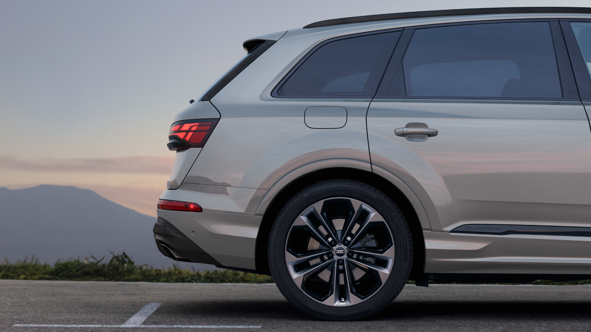 Side view of an Audi vehicle.