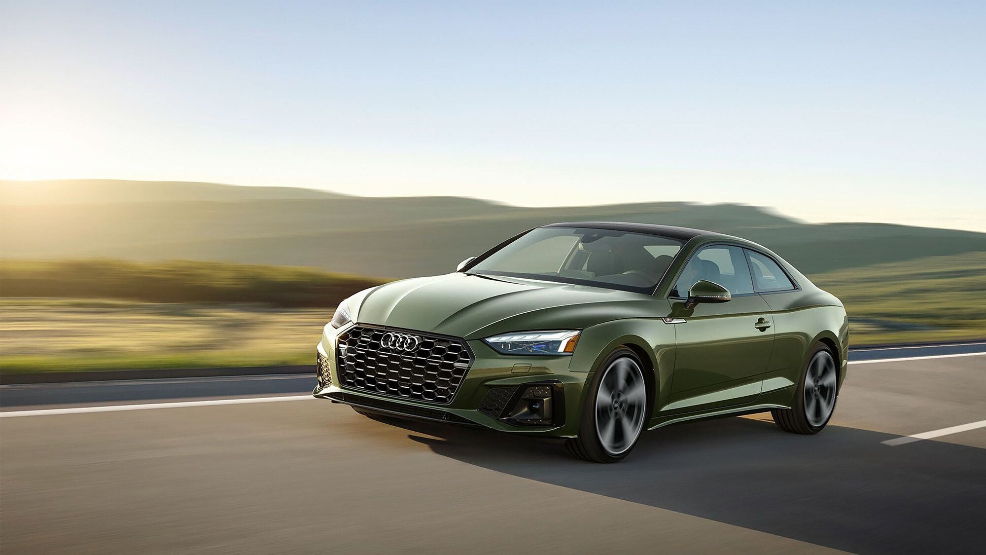 Audi A5 Sedan Driving accross the road