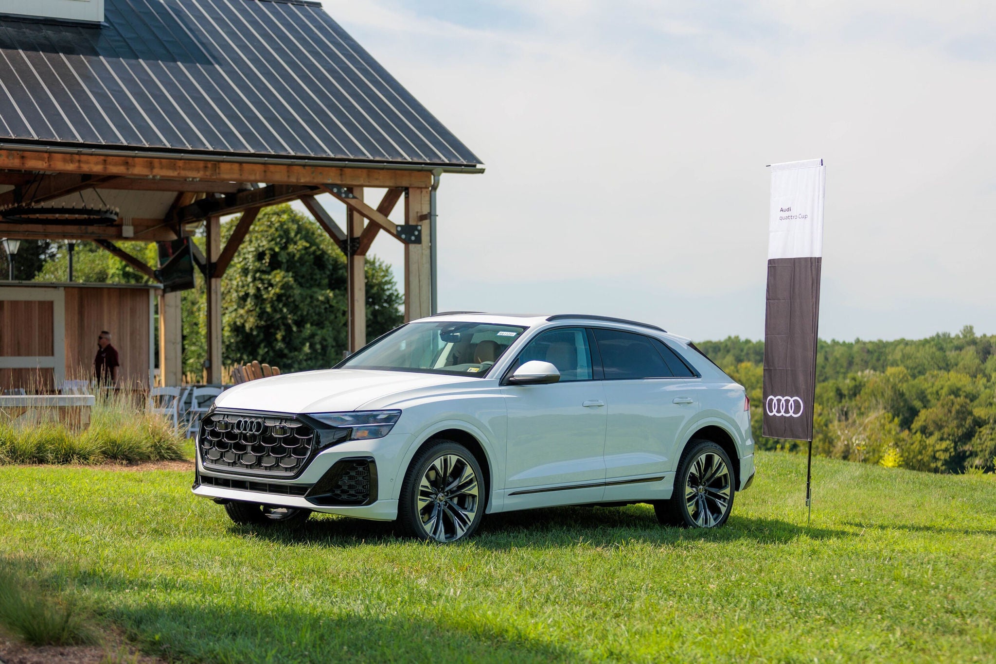 Audi parked near the golf field.