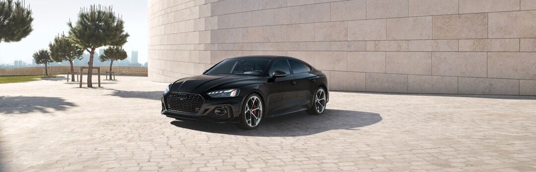 Wide shot of Audi S5 parked.
