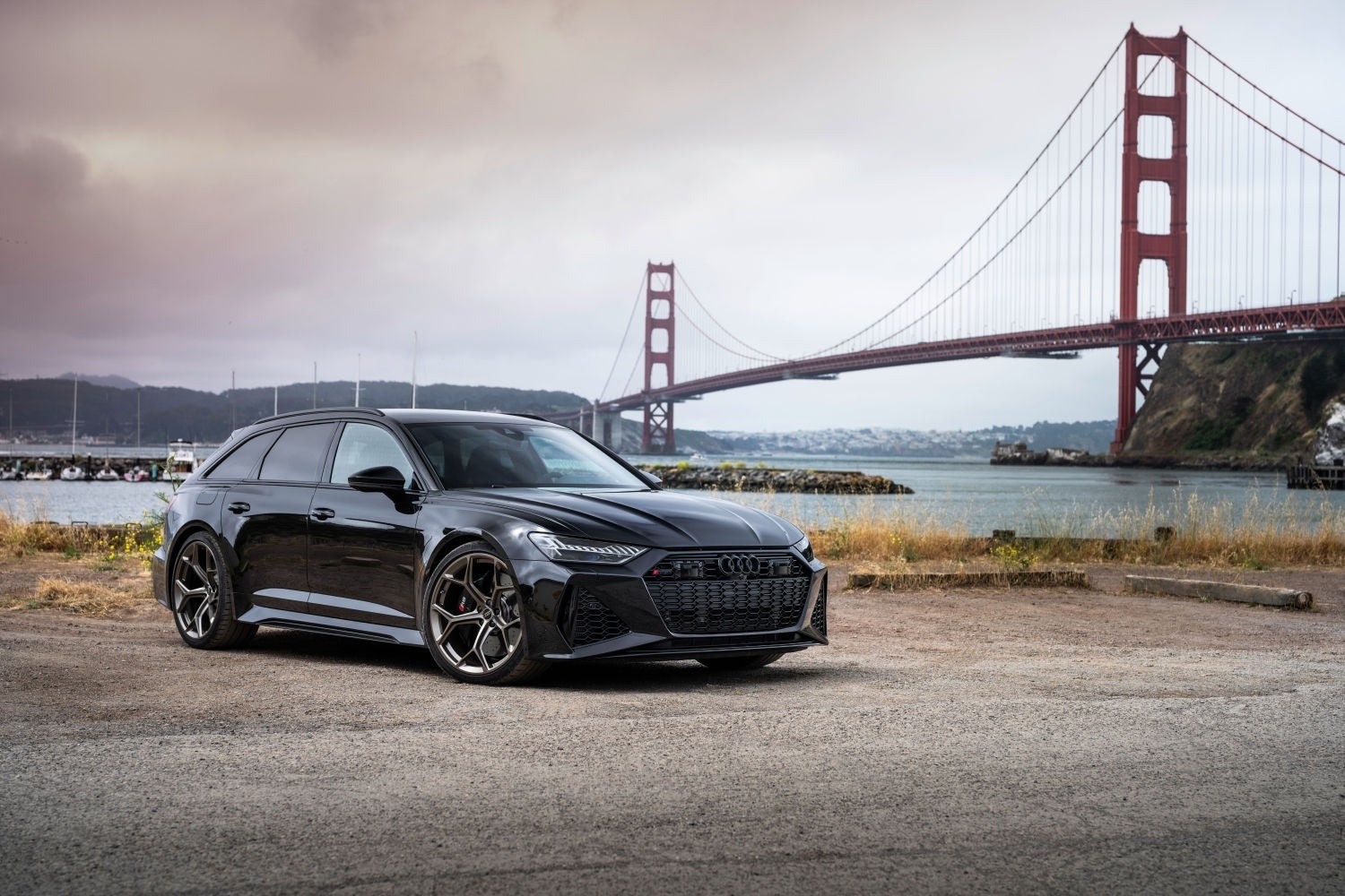 2026 Audi RS 6 for sale parked on a dirt lot overlooking the Golden Gate Bridge