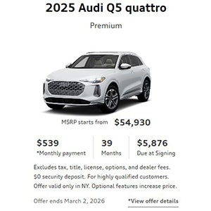 Side view of an Audi a5 parked.