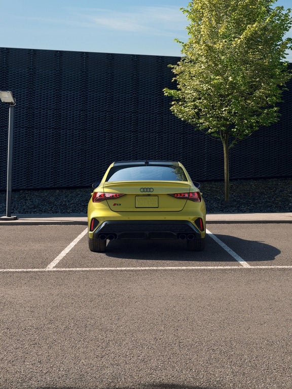 2026 Audi S3 rear three-quarter view with quad exhaust outlets