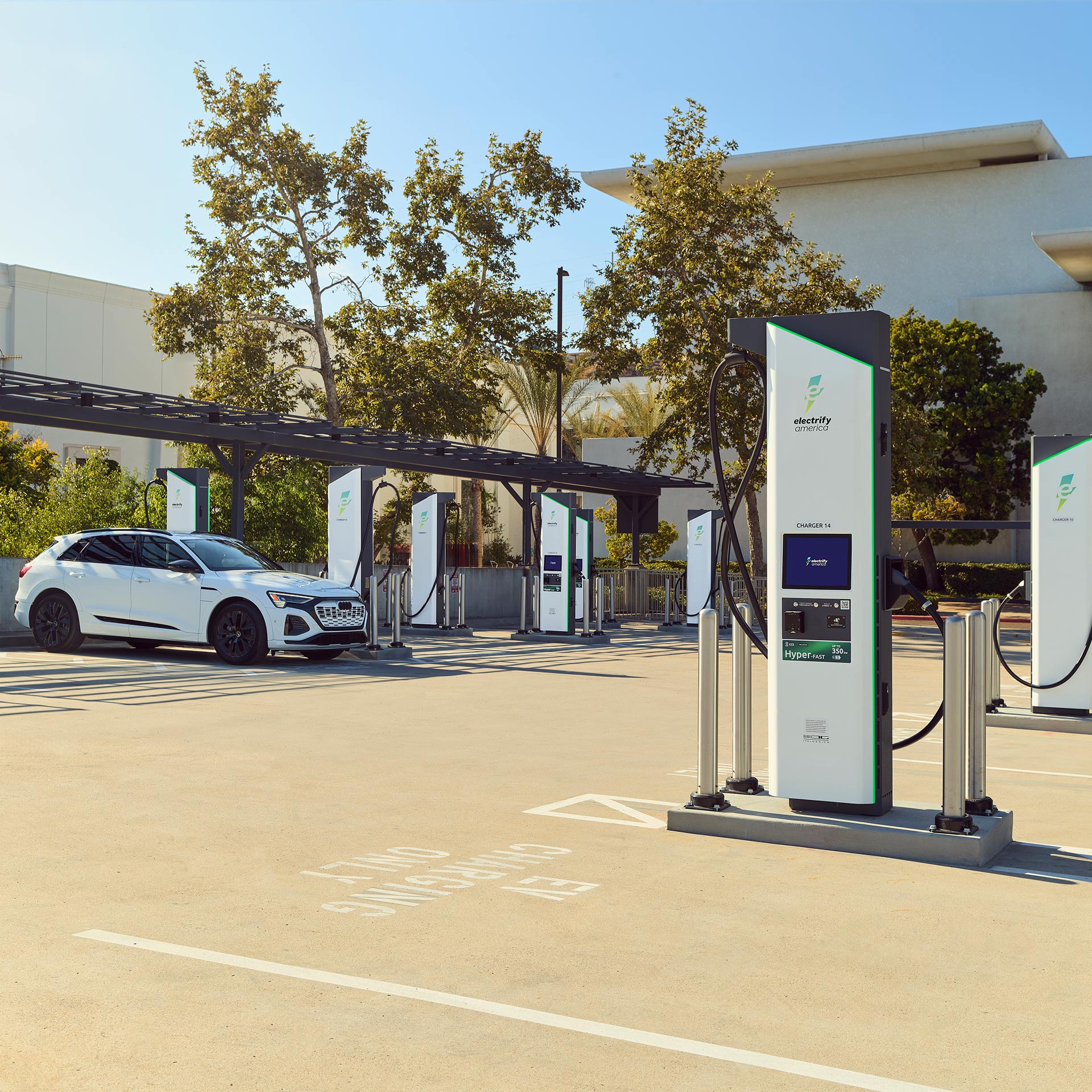 The Audi e-tron® charging at a Electrify America station.