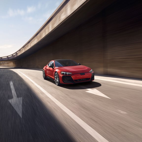 Front view of the Audi RS e-tron GT in motion. 