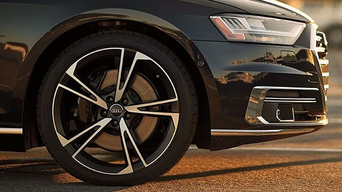 Close up photo of an Audi tire.
