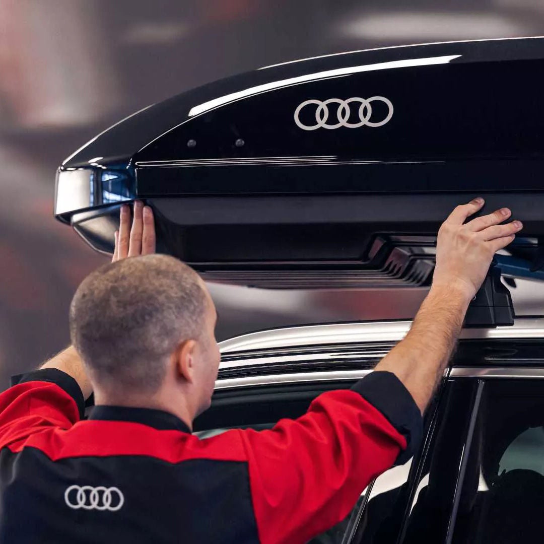 technician installing a Thule