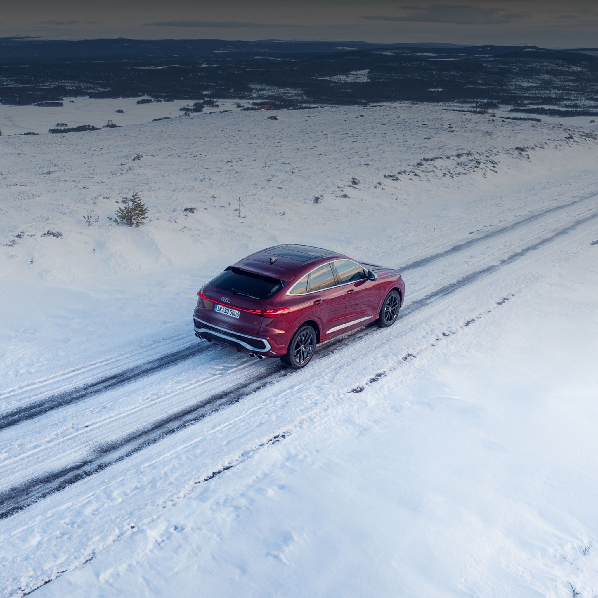 Audi driving on some snow