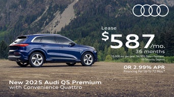 Side view of an Audi Q5 parked.