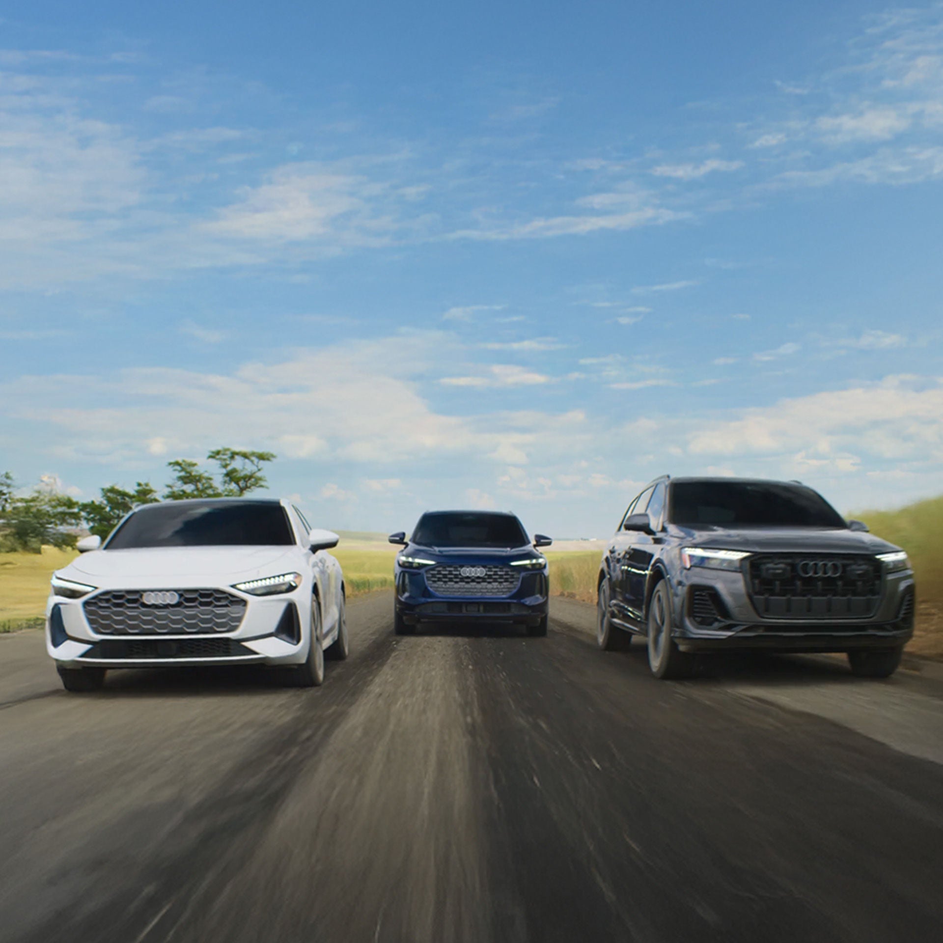 Front angle view of Audi's in a lineup.