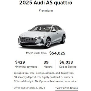 Back view of an Audi Q6 etron accelerating.