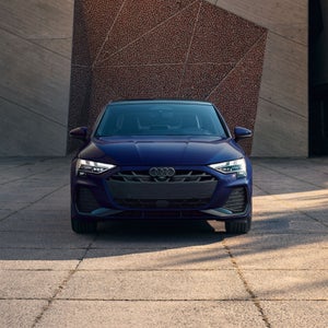 Front profile of the new Audi A3 parked.