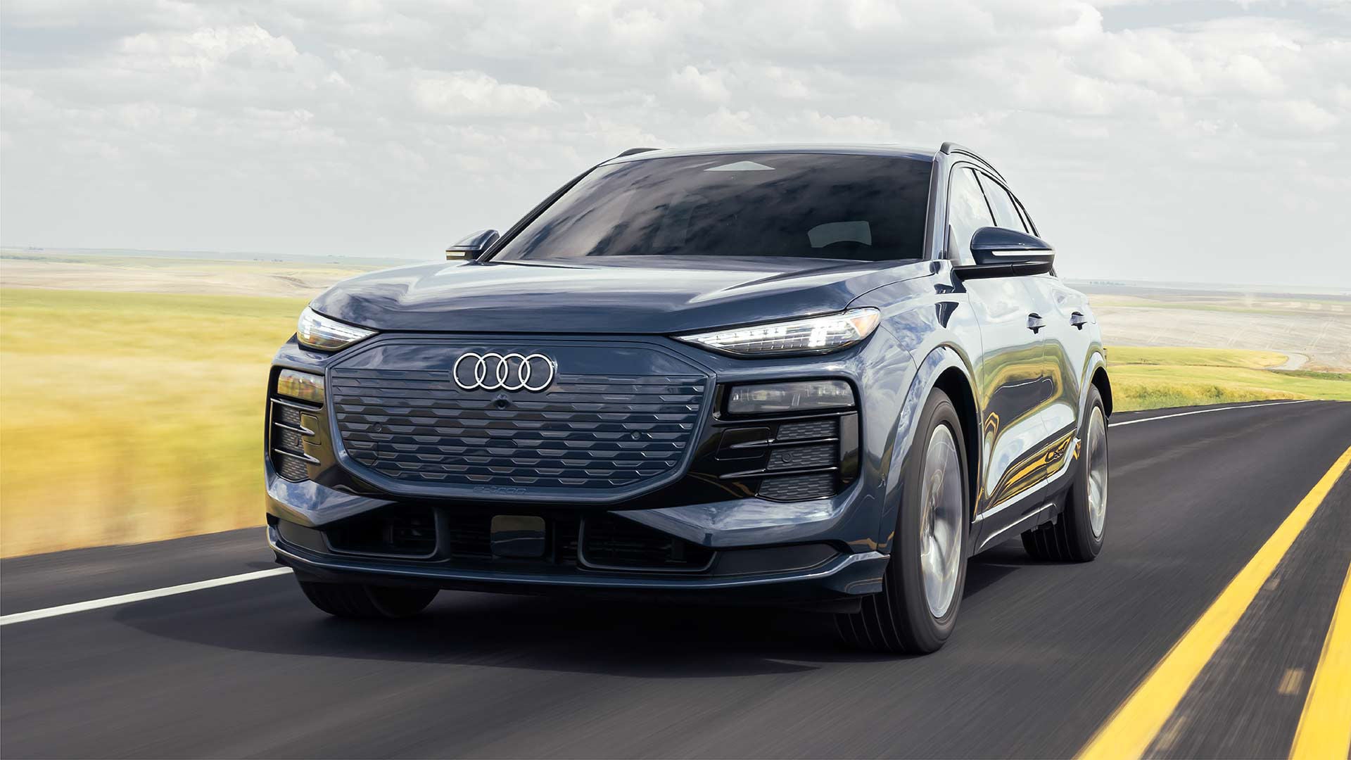 Audi 2025 Audi Q6 e-tron accelerating.